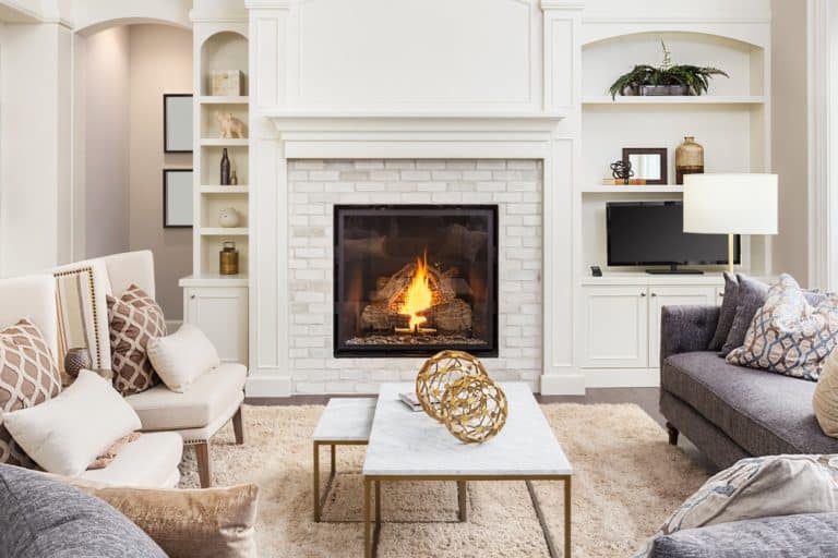 A cozy and modern living room with a fireplace